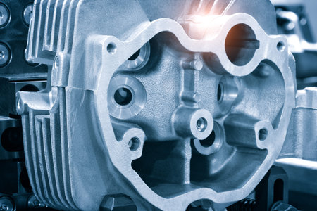 Open block cylinder petrol engine. Close-up, industrial metalworking concept