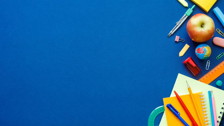 School supplies on blue chalkboard, flat lay with space for text. Banner design, School concept, back to school conceptの写真素材