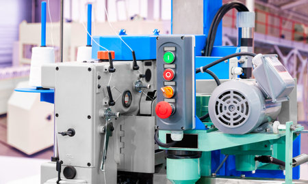 Sewing equipment, loom equipment at a garment factory, industrial concept background