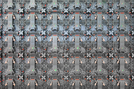 Big Screen Monitor Display group LED Panels backside rear view with cable connector with many small section for advertising background Television technology backgroundの写真素材