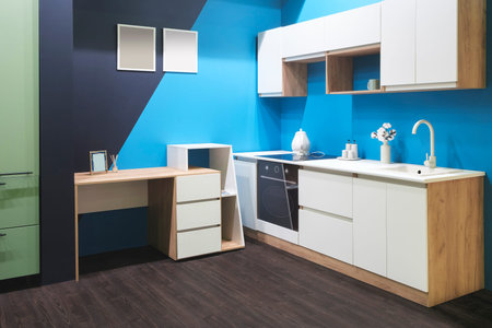 Kitchen blue interior. Modern kitchen washbasin with faucet in kitchen interior.