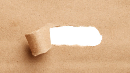 Paper peel, torn paper with space a white background for text showing. Empty space for your message. space for advertising copyの写真素材