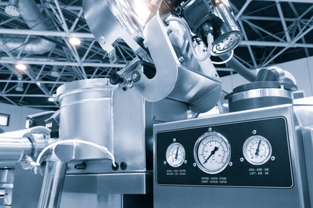 Industrial open food meat mixer with knives in food industry close-up. Industrial open mixer in food industry close-upの写真素材
