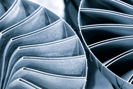 Steel blades of turbine propeller 3D printing. close-up view. Selected focus on foreground, industrial additive technologies conceptの写真素材