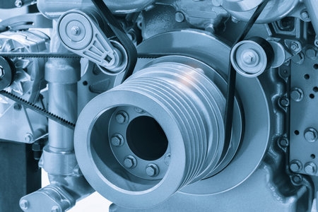 Belt drive of Diesel engine electric generator. Close up car timing belt. Belt transmission close up. industrial technology concept backgroundの写真素材