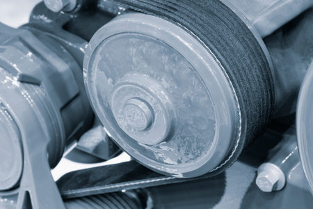 Belt drive of Diesel engine electric generator. Close up car timing belt. Belt transmission close...