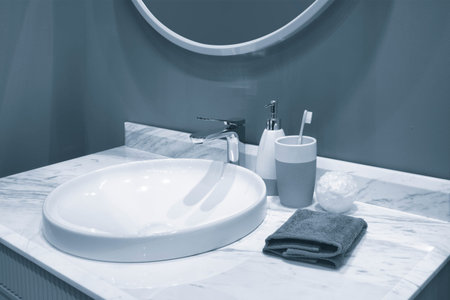 Modern bathroom interior, clean bright stylish designer modern bathroom in blue tone