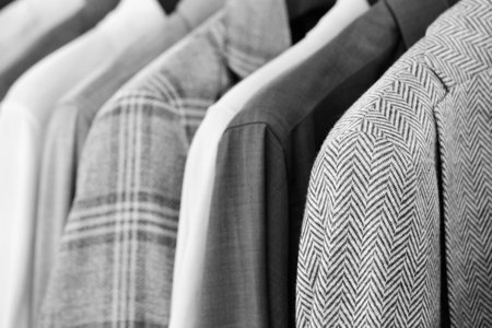 Men suits in a fashion shopの写真素材