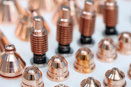 background of metal products screws, nozzles, bolts and studs for welding equipment, industrial concept backgroundの写真素材