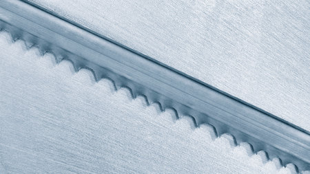 The automatic band saw machine cutting the metal bar with coolant method. The machine tool for industrial purpose.の写真素材