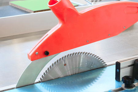 Automatic circular saw with circular saw for cutting wood. Woodworking concept backgroundの写真素材