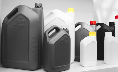Various plastic canisters for packaging chemical liquids, water, fuel and other liquids.の写真素材