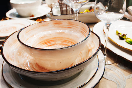 Various pink designer dishes on the tableの写真素材