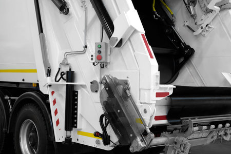 A modern machine for transporting waste waste with a press and automatic loading and unloading, rear...