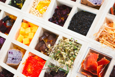 A wooden box filled with a variety of fruits and vegetables. The box is filled with different types...