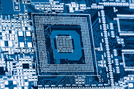 A close up of a computer chip with the letter Q on it. Concept of technology and innovationの写真素材