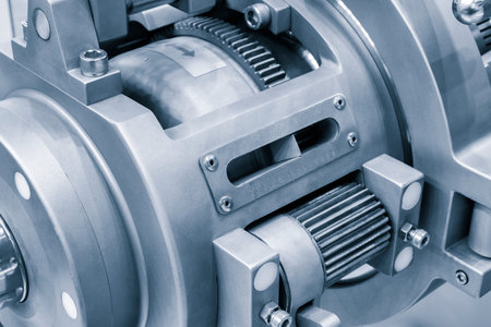 A machine with a blue and silver color. The machine has a lot of gears and is made of metal