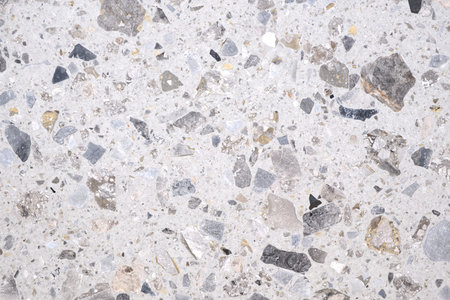 Abstract textured stone background with a pattern of small particles interspersed