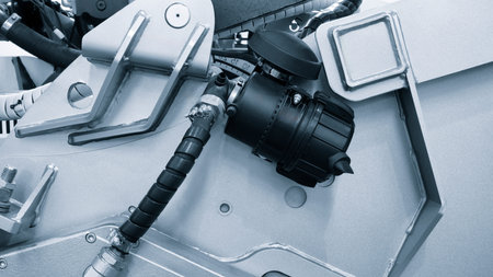 Hydraulic mechanical drive on an industrial machine, industrial concept background.