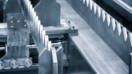 Row metal sheets with sharp ends in industrial plant. sheets are metal have sharp uneven edge sheets arranged in row some of them overlapping each other. Industrial metalworking concept backgroundの写真素材