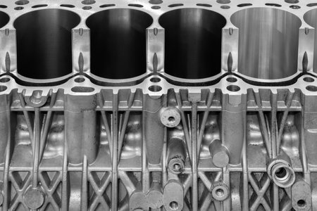 cylinder block of diesel engine repair close-up. cylinder block in blue tone. Car engine cylinder heads. Industry car service conceptの写真素材