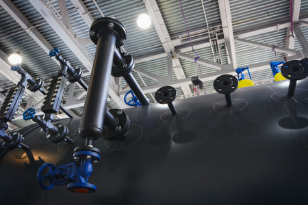Industrial concept. Boiler equipment - valves, tubes, pressure gauges, thermometers, heaters, tanks,...