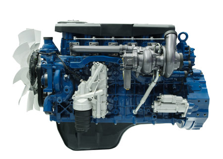 A blue engine with a white fan on the front. The engine is a large industrial engine isolated on...