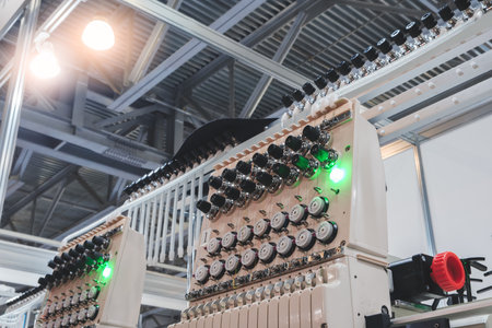 Industrial machine for embroidery of multi-colored threads on fabricの写真素材