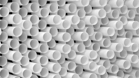 White background with many white cylinders. cylinders are arranged in pattern are all same size, abstract texture background for template pages and bannersの写真素材