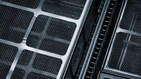close up of dark blue and silver mesh with squares. The mesh is made of metal and has a grid pattern