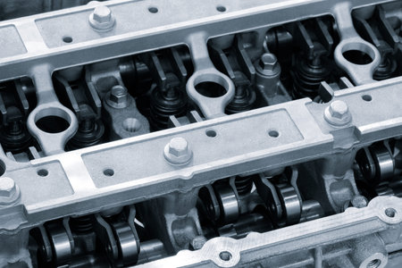 disassembled silver car engine auto service concept background.