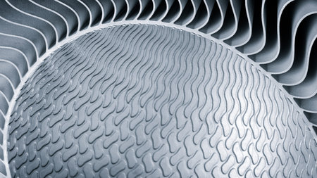 metal piece with a pattern created by a 3D printer. lines are arranged in a spiral pattern, creating...