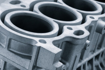 disassembled silver car engine auto service concept background.