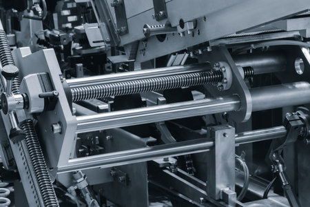 Close up of industrial metal screw shaft as part of screw transmission. Industrial background...