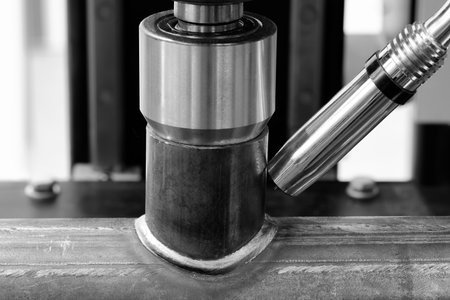 Metalworking industry concept, industrial equipment for cutting and welding metal detailsの写真素材