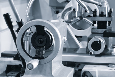 Control disk of metalworking machine with applied measuring ruler and control handle. metalworking industrial machines conceptの写真素材