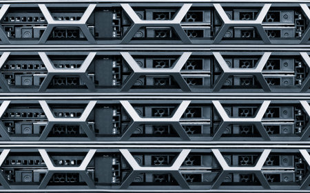 Row of computer servers with a white border. The servers are stacked on top of each other