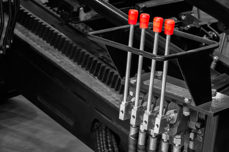 Hydraulic automatic transmission with four control levers. Industrial concept background.