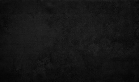 Black dark wall with cracks and holes. wall is covered with white paint and has rough texture...