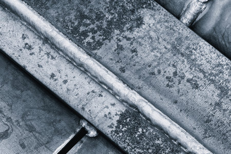 Welding seam of modern industrial welding machine, industrial concept background.の写真素材