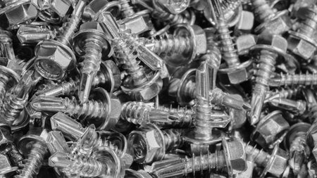 Close-up of long screws and self-tapping screws as textured tool industrial backgroundの写真素材