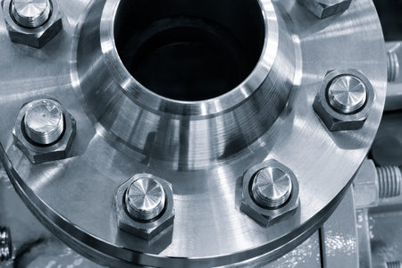 Steel water pipe with a plate on top for bolting. The plate is made of metal and has a hole in the...