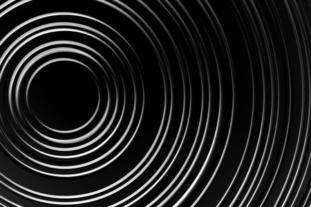 image is white circle on black background. circle is surrounded by series of smaller circles,...