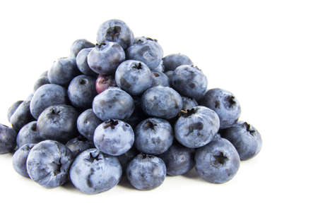 Pyramid of fresh blueberries isolated on white backgroundの写真素材