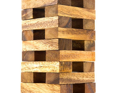 Traditional asian wooden tower block game isolated on whiteの写真素材