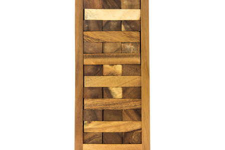 Traditional asian wooden tower block game isolated on whiteの写真素材
