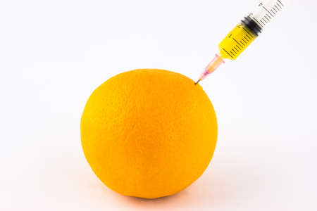 Obtaining orange juice concept isolated on white backgroundの写真素材