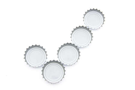 Conceptual check mark image made of used beer capsの写真素材