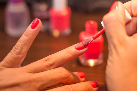 Red finger nails paintingの写真素材