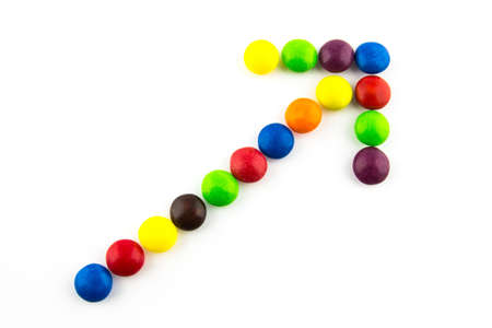 Growing trend concept made of multicolored candiesの写真素材